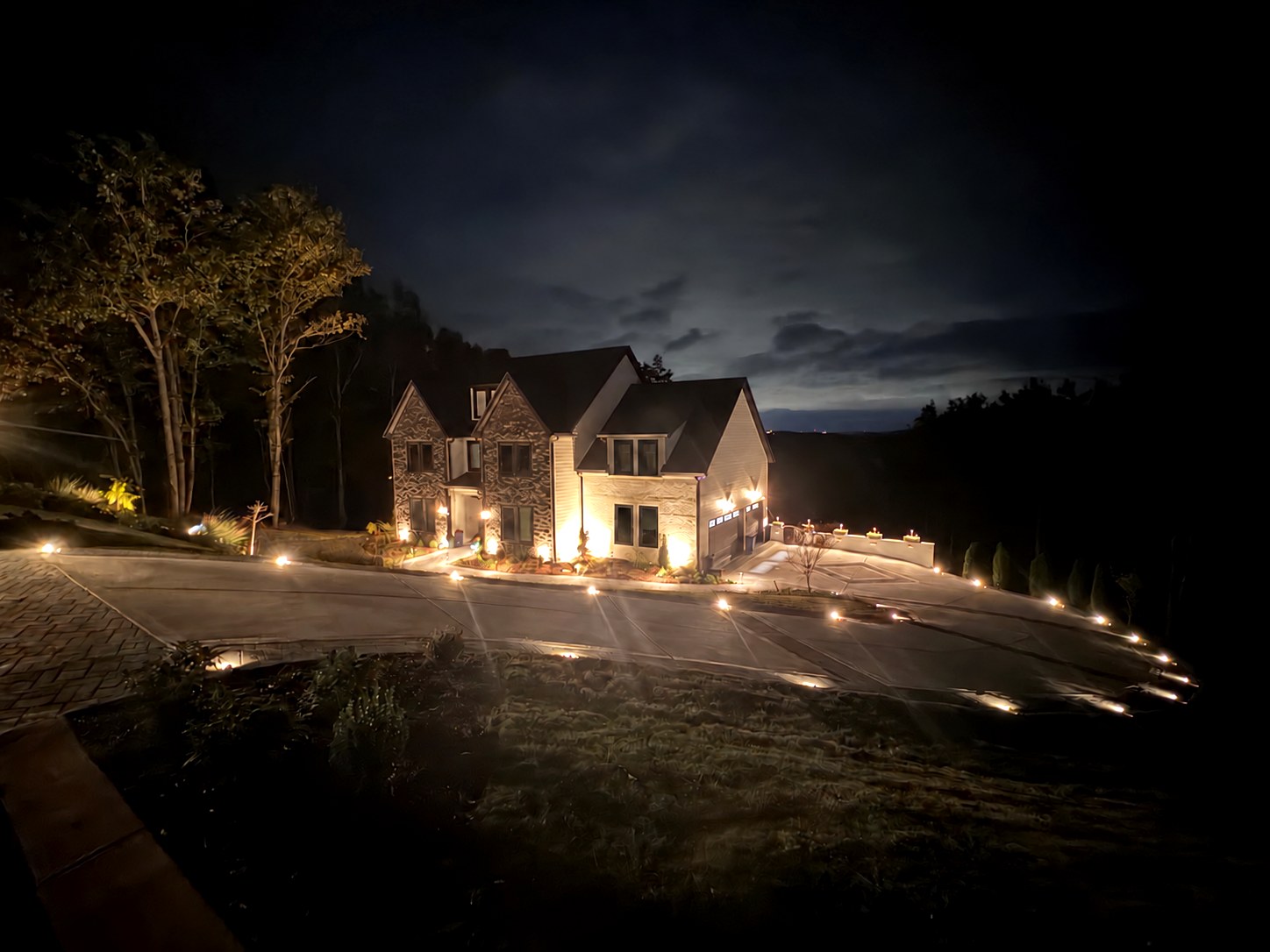 Night landscape and driveway lighting on a Chattanooga-area home by River City Electric